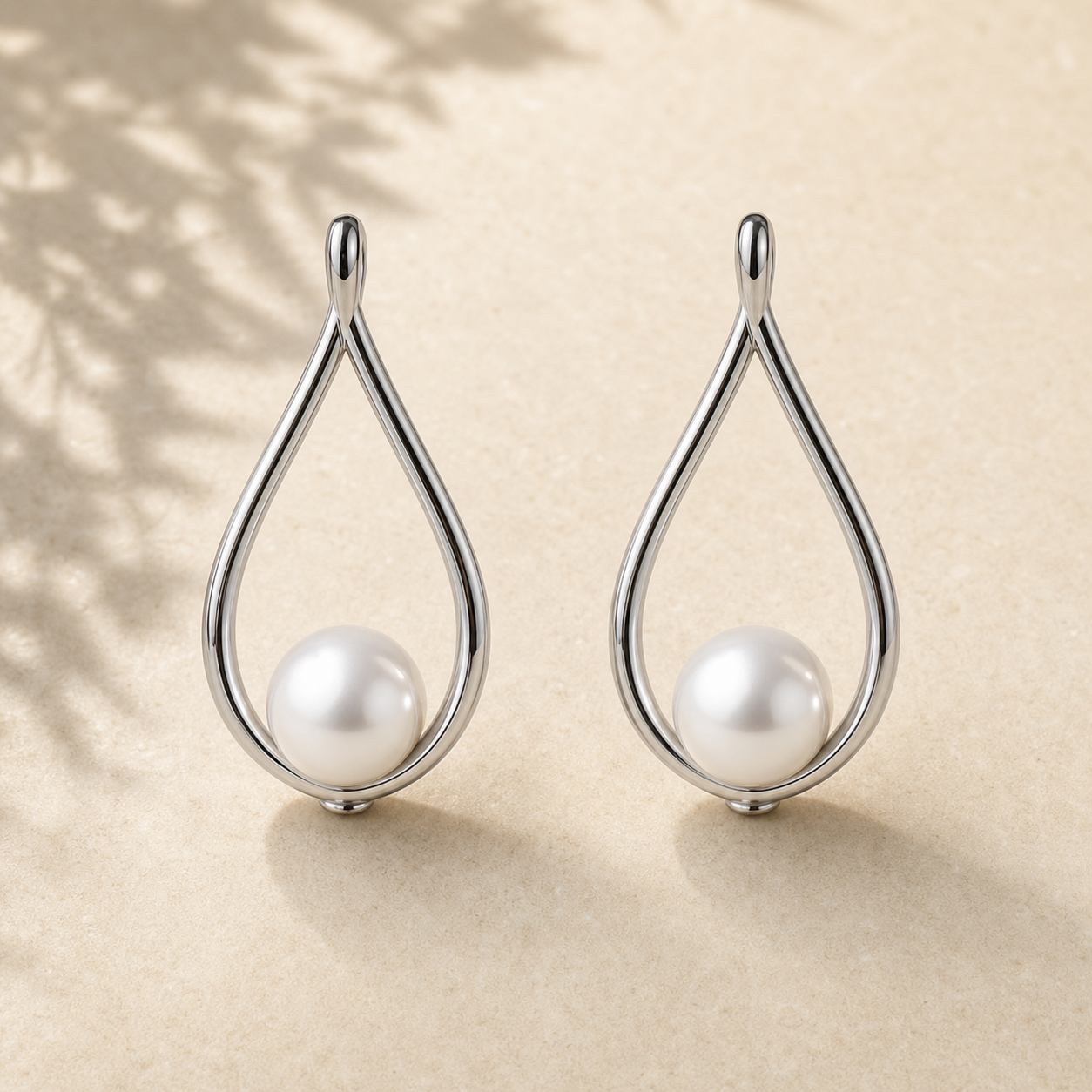 Teardrop Pearl Earrings — Rhodium
