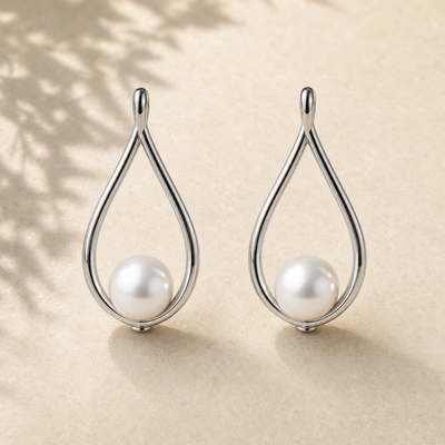 Teardrop Pearl Earrings — Rhodium